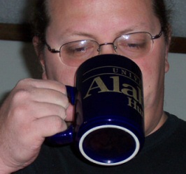 Doc, drinking coffee and a little something extra
